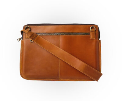 a brown leather bag with a strap